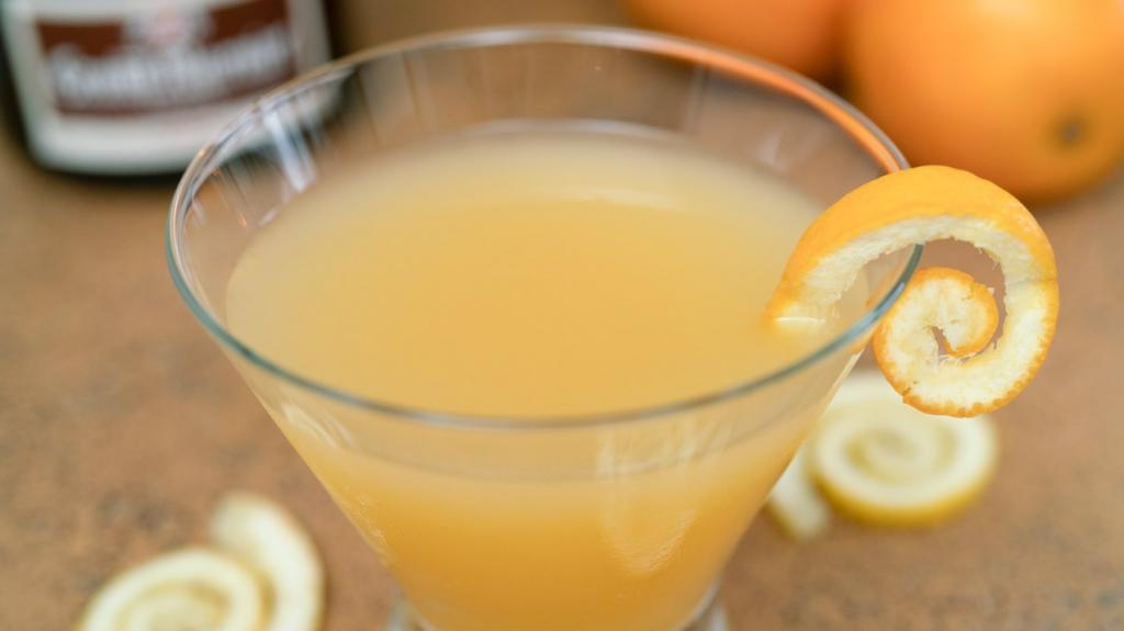 Screwdriver cocktail up close with orange peel garnish