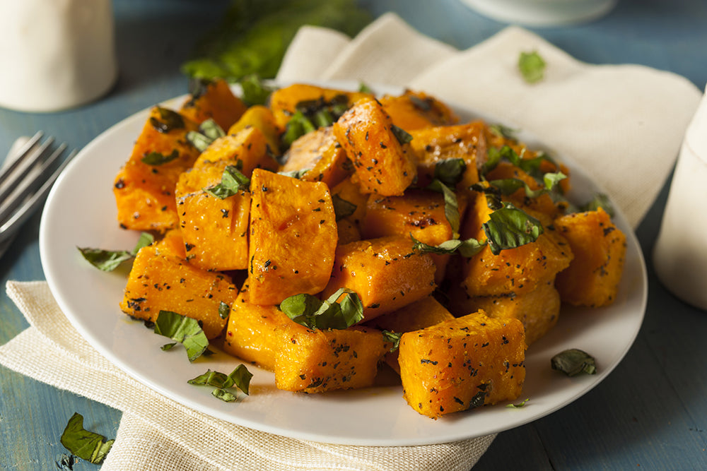 Honey Glazed Roasted Butternut Squash Recipe on plate garnished with chopped parsley