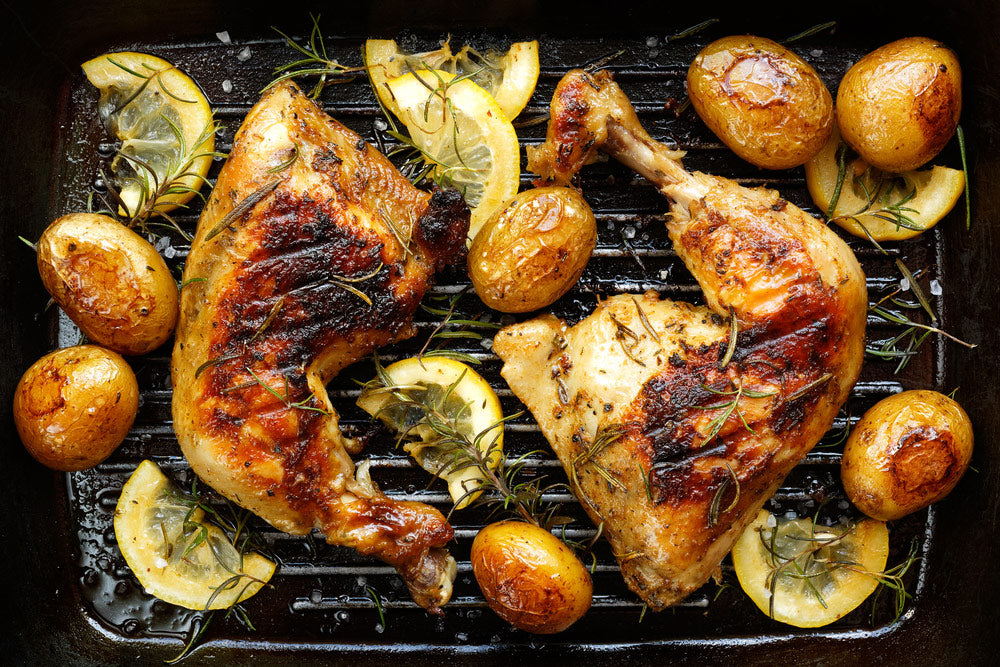 Honey glazed chicken on the grill for dinner tonight featuring honey bbq sauce.