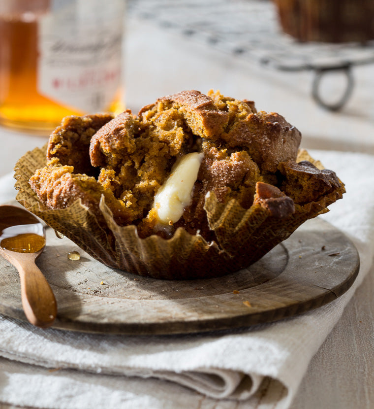 These Paleo Pumpkin Muffins are so easy to make and incredibly delicious! Gluten free, dairy free and sweetened with honey. Serve for breakfast or dessert.