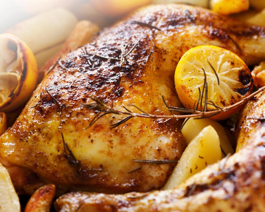 Roasted chicken made with a honey mustard marinade and lemon for National Mustard Day