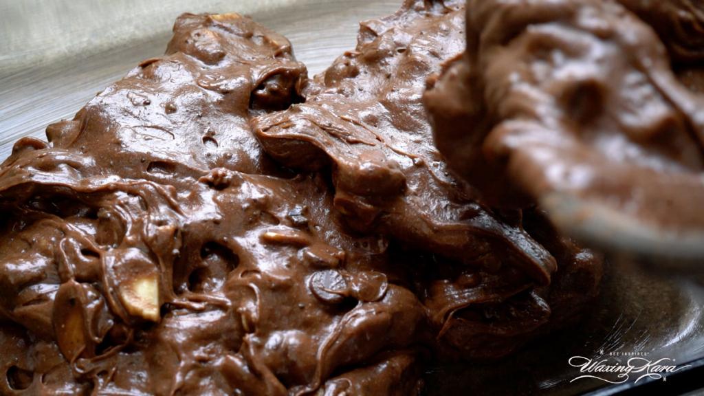 close-up of brownie batter being mixed