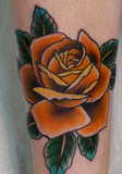 rose orange tatoo