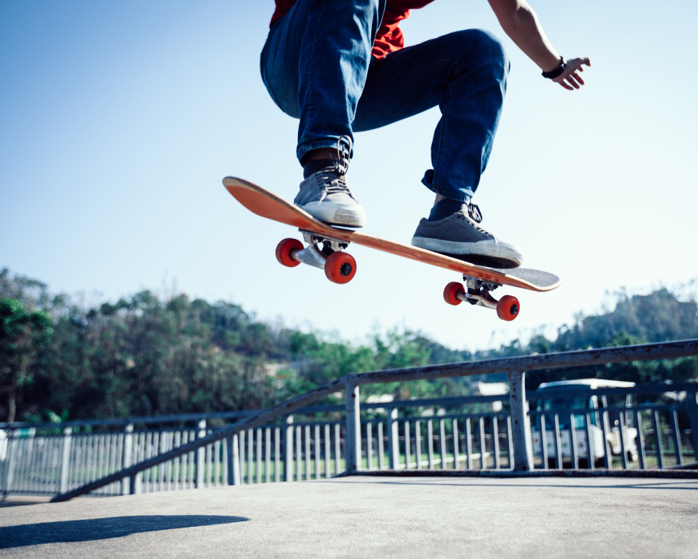 A man playing a skateboard