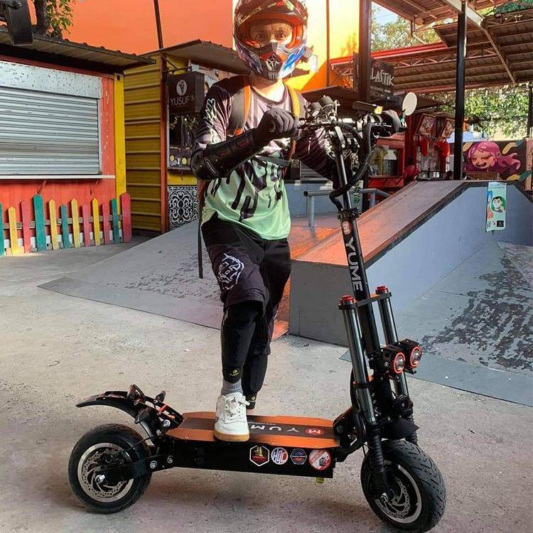 a man using a scooter