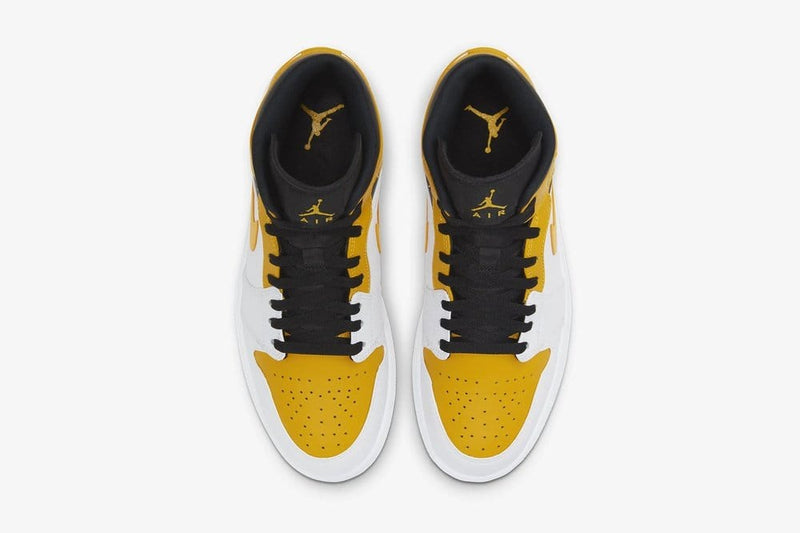 gold and white jordan shoes