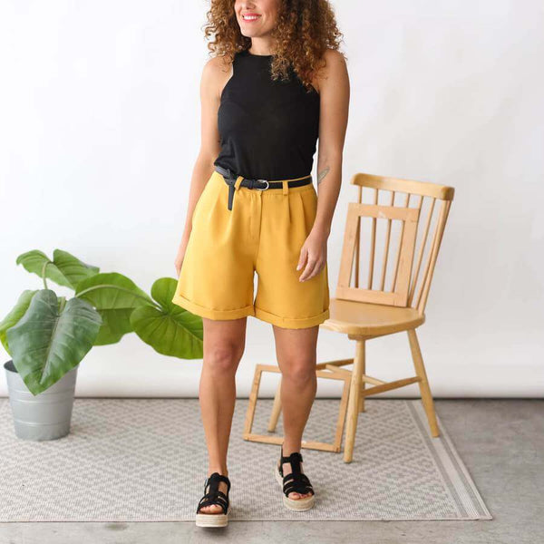Look yellow pants and black blouse
