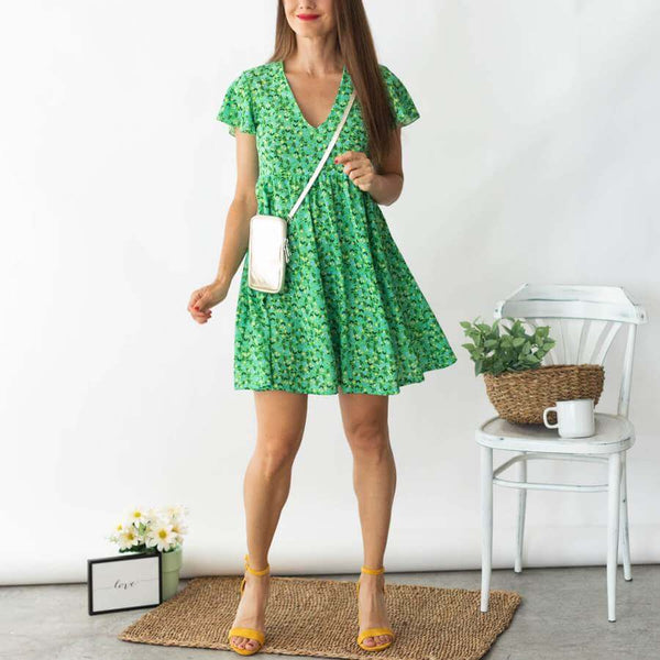 Look printed green dress and striking accessories