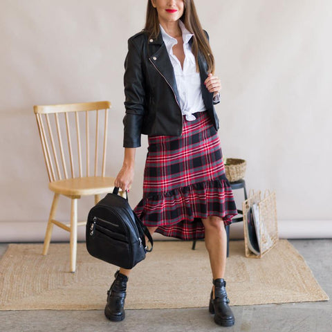 Red and black plaid skirt with urban style leather jacket