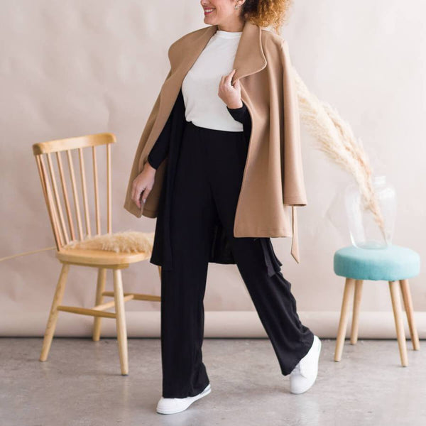 Look black pants with beige coat