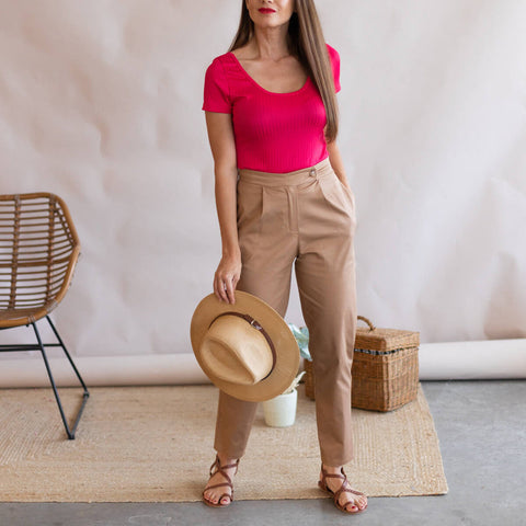 Brown pants with fuchsia top 