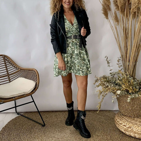 Green printed dress with black leather jacket