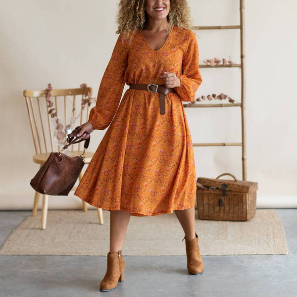 Look orange dress with brown accessories