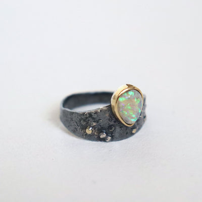 lightning ridge opal set in 14k gold bezel, black silver ring, handmade by roff jewellery
