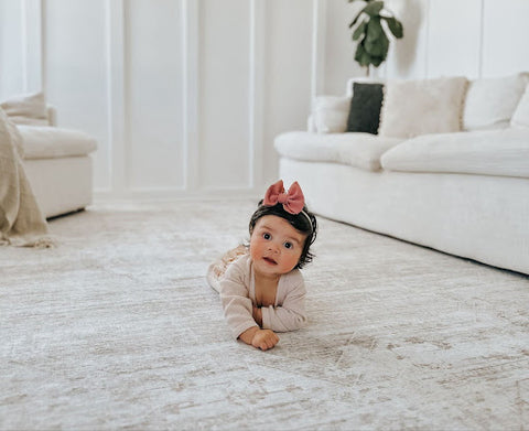 baby on a tumble rug