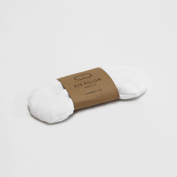 Camden Co. French White Linen Eye Pillow with kraft sleeve packaging.