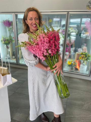 Happy florist Natasha Bezverkha at the work