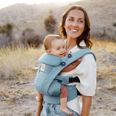 Ergobaby Omni Dream Baby Carrier in Slate worn by Mother
