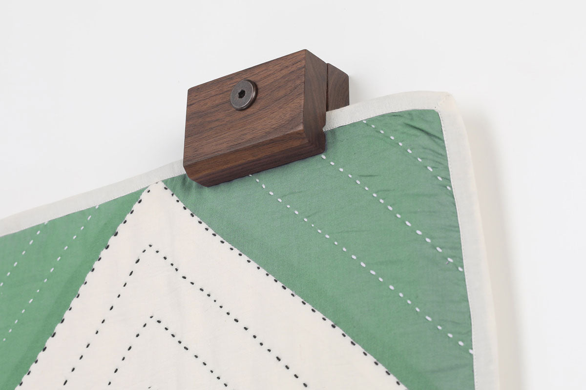 Creating a wood quilt hanger turns an IKEA rug into a wall tapestry - IKEA  Hackers