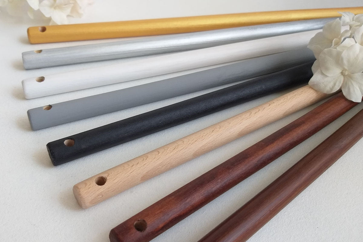 Dowel rods used for hanging quilts with a fabric loop sewn in