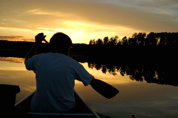 Canoeing at sunset