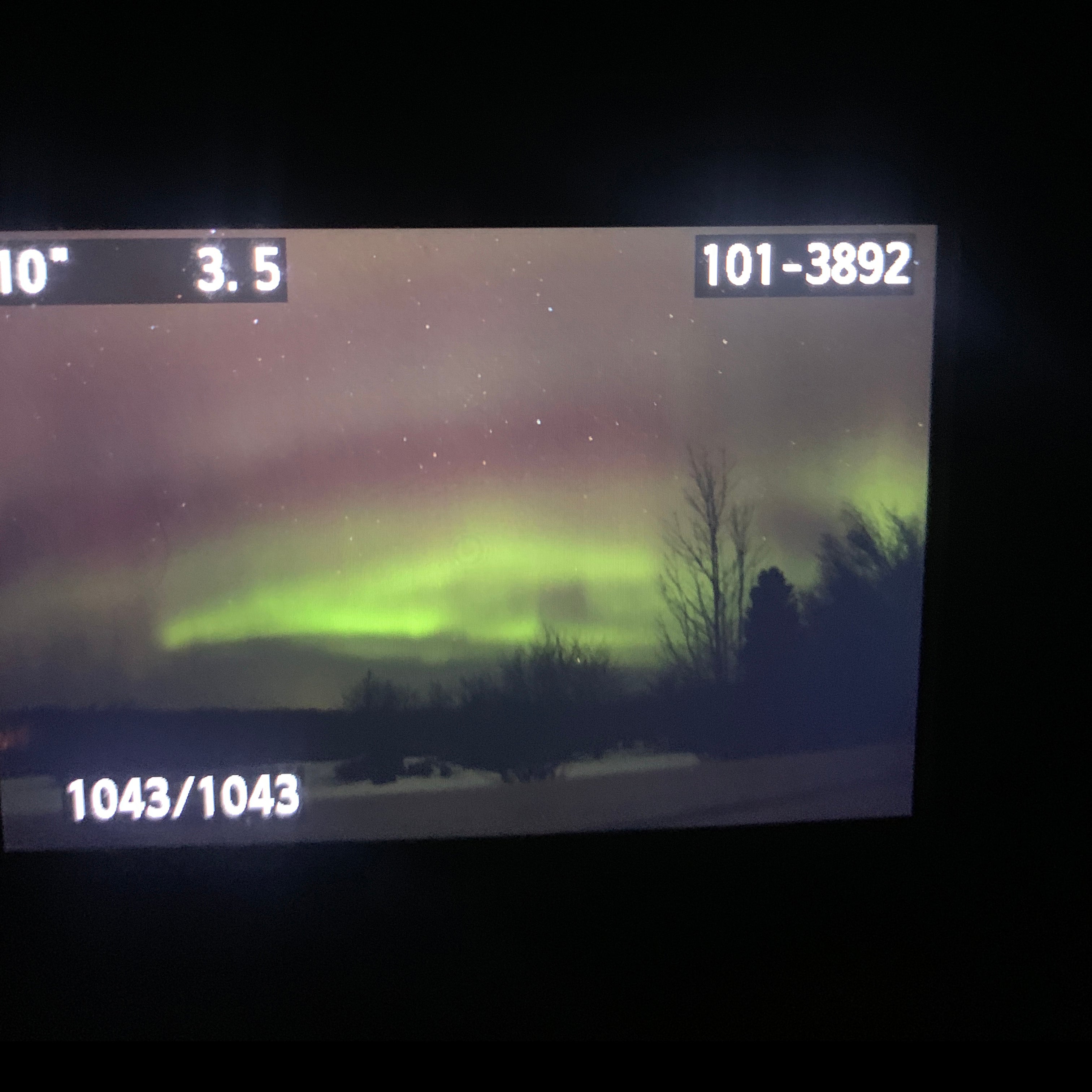 Northern Lights throught the back of a camera