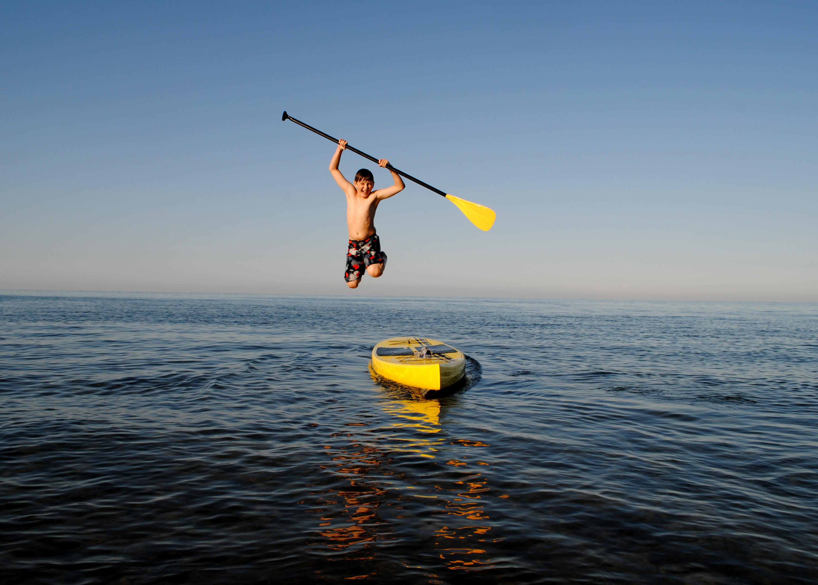 jumping from a stand up paddleboard