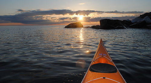 Sunset sea kayaking on Lake Superior at Presque Isle