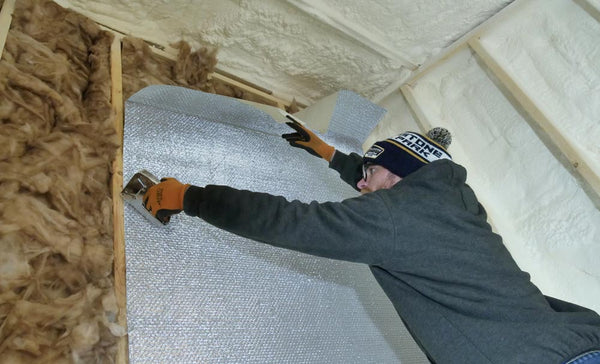 Combining bubble insulation radiant barrier with batt insulation