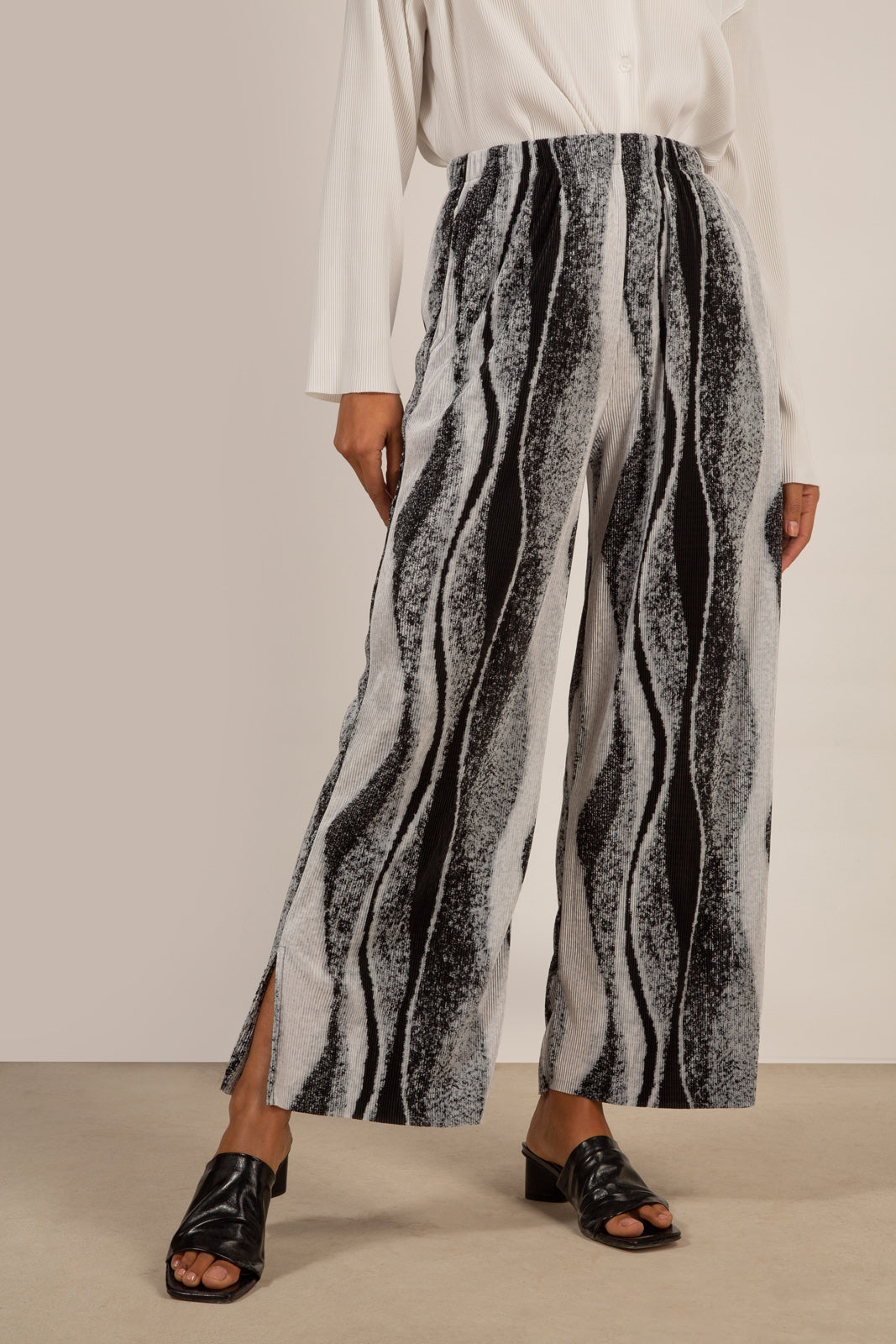 Grey and black abstract print trousers