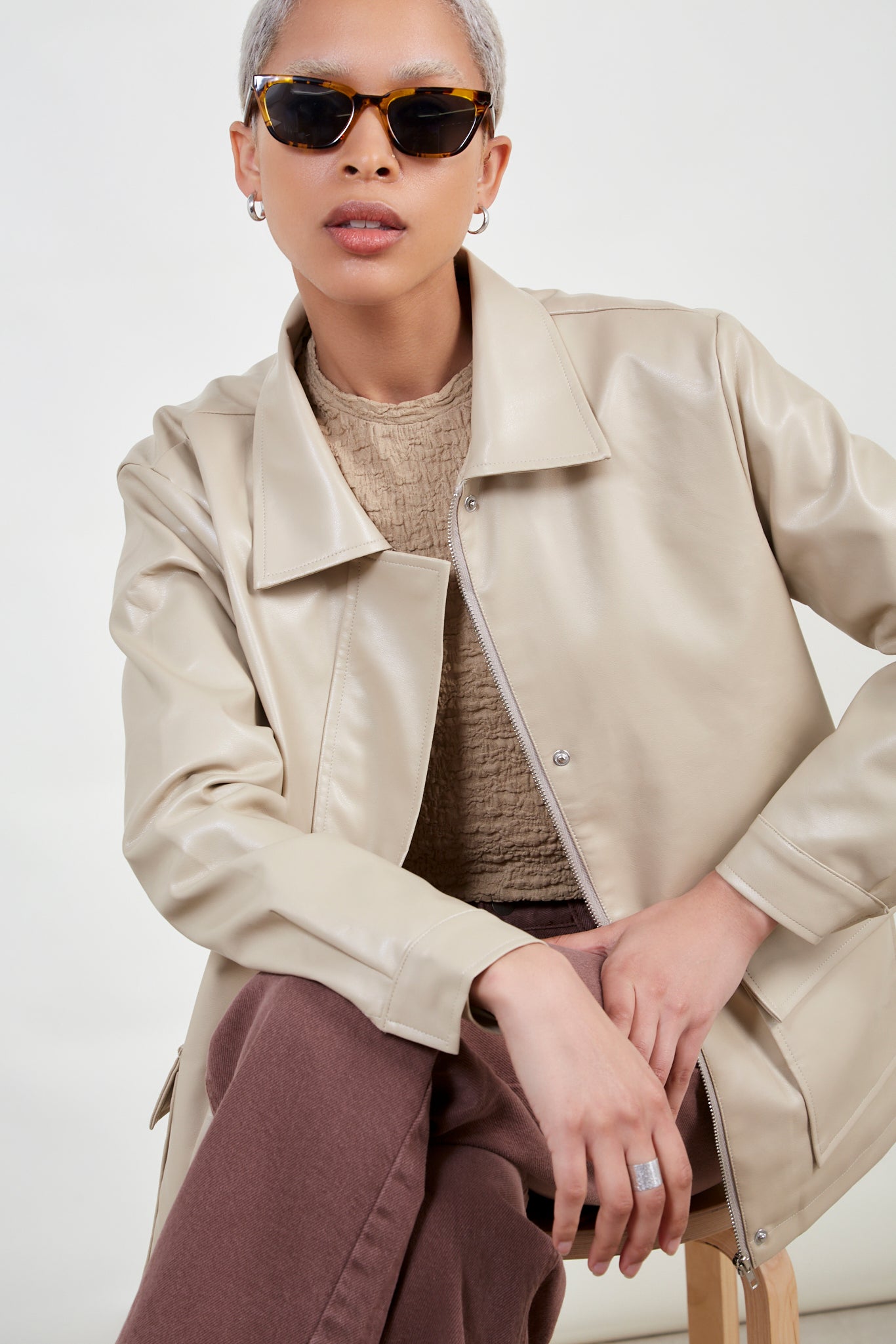 Beige vegan leather belted jacket