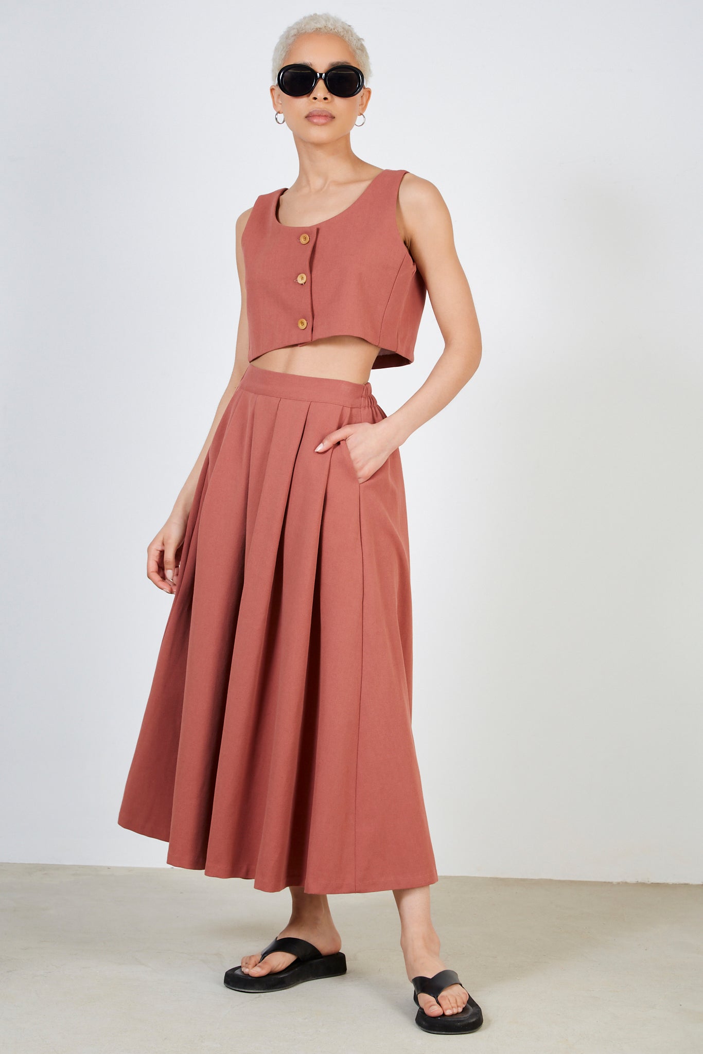 Rust red pleated skirt