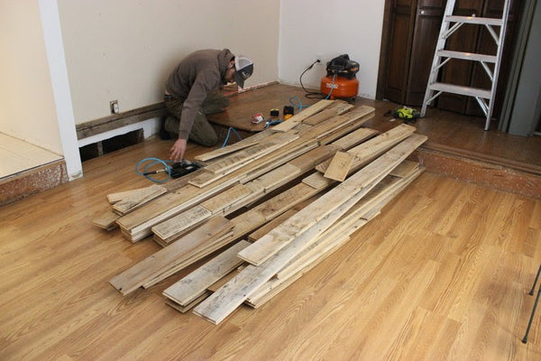 Reclaimed Wood Wall Planks Being Installed