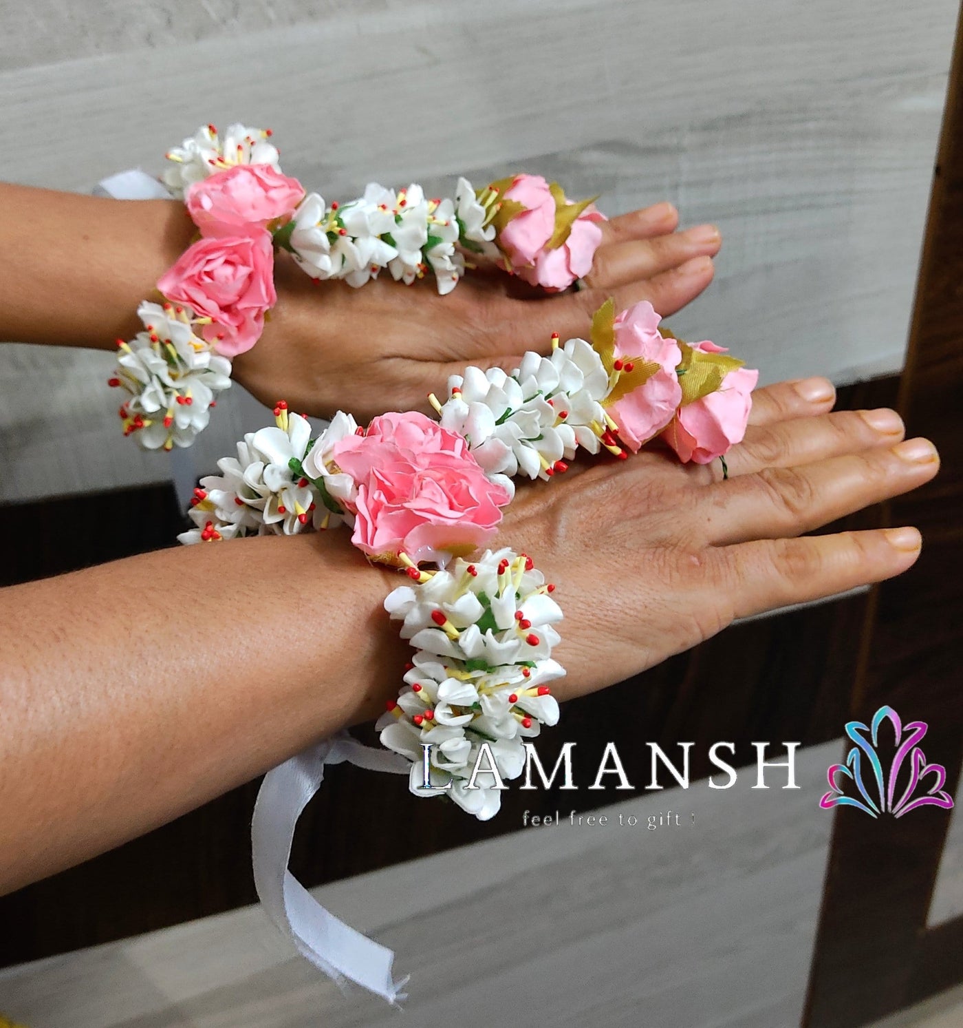 Premium Photo  Hands of four women with tied flowers on their hands