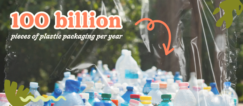 100 billion in bold with orange writing ontop of used plastic bottles