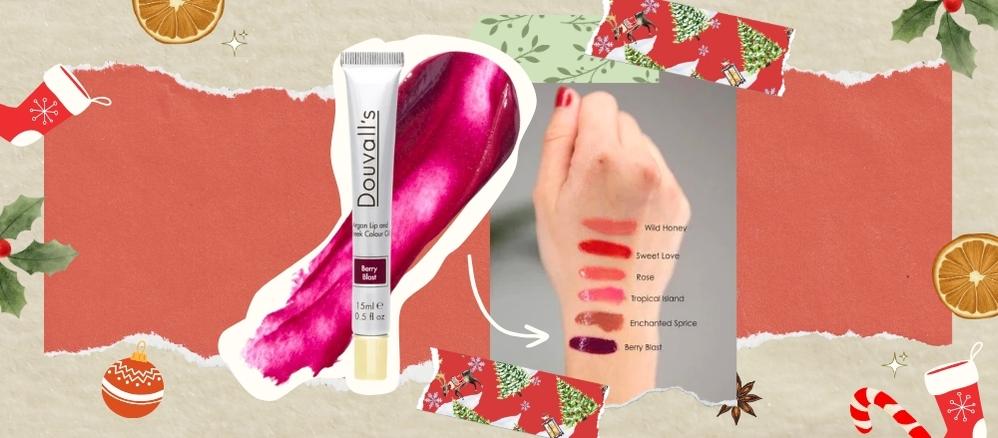 Lip and Cheek colour Oil in Berry Blast on brown background with Christmas cartoon graphics