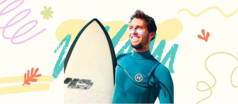 A man holding a surfboard on off white background with cartoon graphics