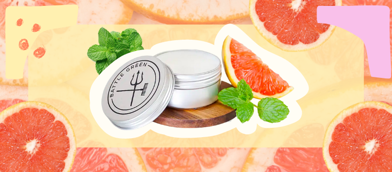 Grapefruit & Mint Natural Deodorant Tin on Grapefruit background with cartoon graphics