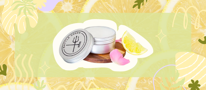 Lemon & Rose Natural Deodorant Tin on lemon background with cartoon graphics