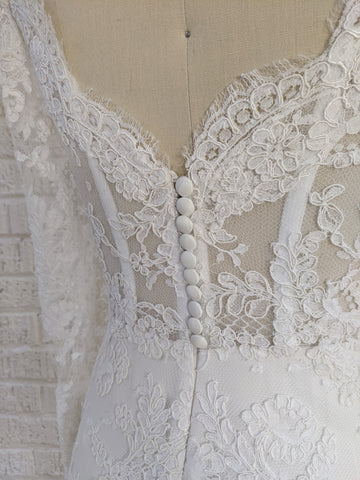 Classic French lace wedding dress by Catherine Langlois. Custom made in Toronto.