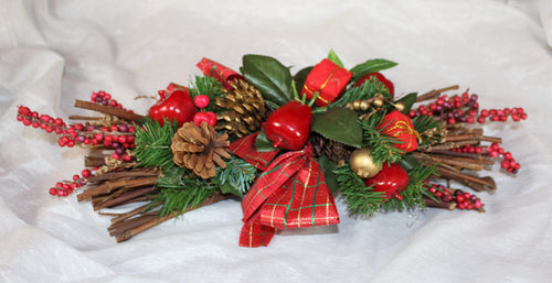 Decorated Ornamental Christmas Bundle Of Sticks With Red Bows