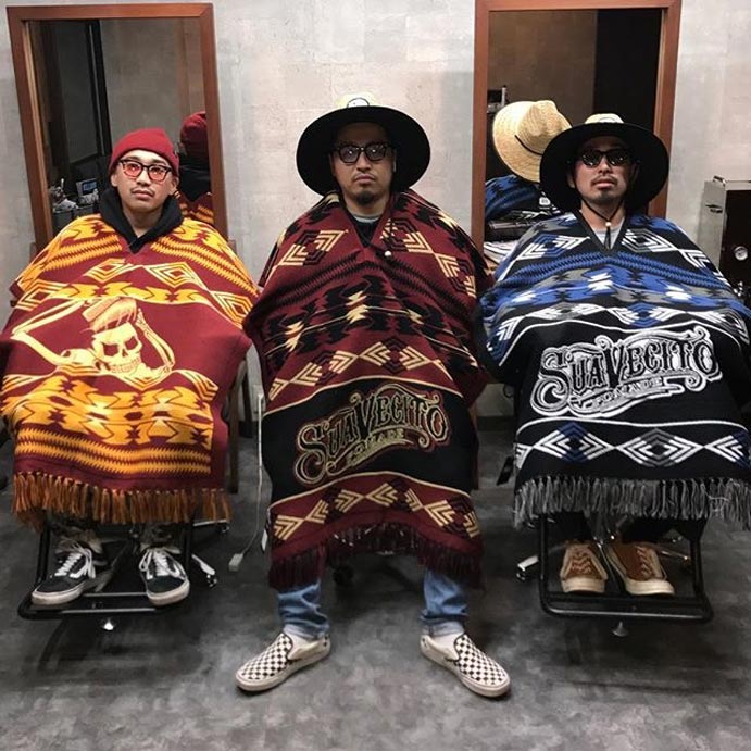 Three Men Wearing Suavecito Pomade Panchos 