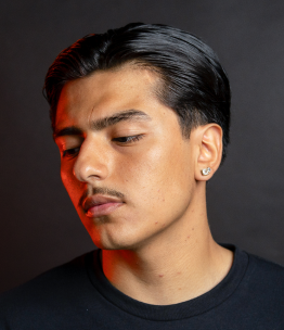 Model with hair style set by Suavecito Grooming (Non Aerosol Hairspray)