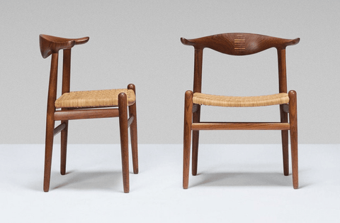 Teak and cane "cow horn" chairs