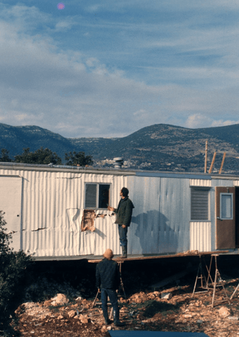 inspecting a trashed mobile home