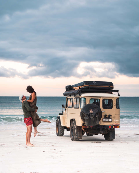 Overland Travellers on beach