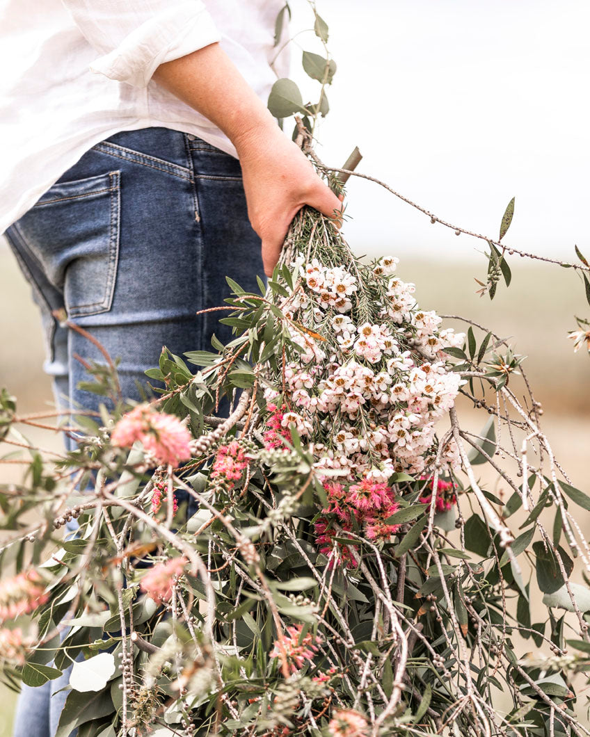 Lady with bush flowers