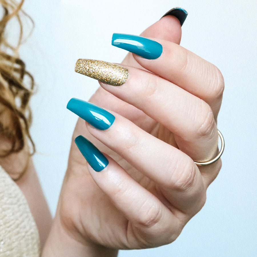 teal and gold nails