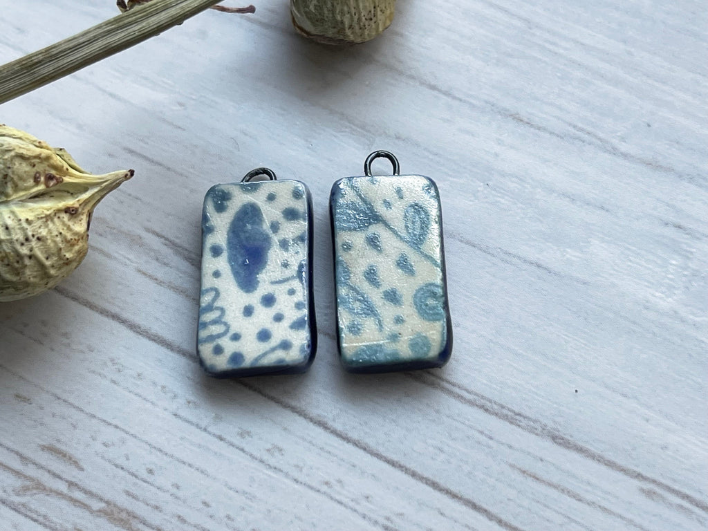 Purple Quatrefoil Earring Bead Pair, Porcelain Ceramic Charms, Jewelry –  Bleu Dog Beads