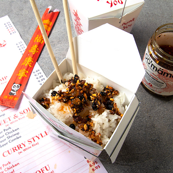 Chinese leftover rice with oo’mämē Chinese Chile Crisp with take out menu and chopsticks